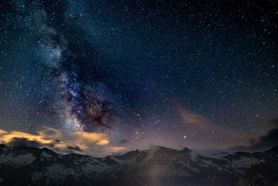 Scenic view of star field against sky at night