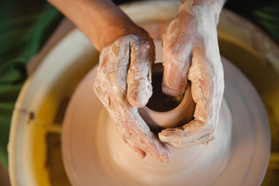 Cropped image of man working at workshop