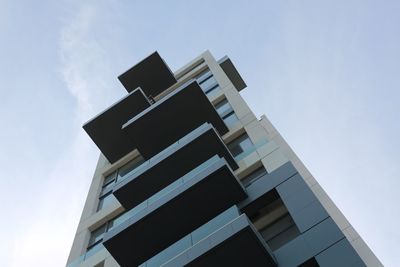 Low angle view of modern building against sky