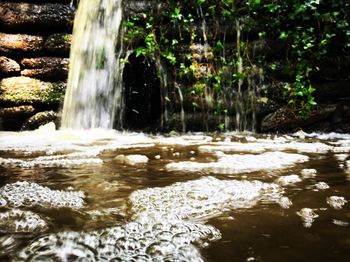 River flowing through rocks