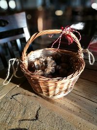 Close-up of chestnut in basket on table
