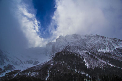 Scenic view of mountains against sky during winter