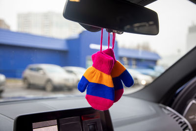 Close-up of umbrella in car