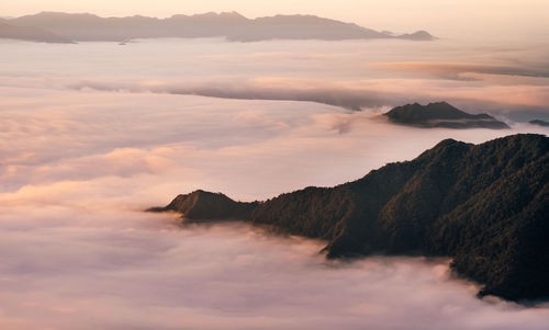 Scenic view of mountains against sky during sunset