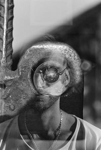 Close-up portrait of man wearing eyeglasses