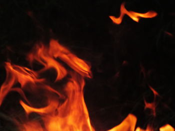 Close-up of fire against black background