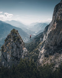 Panoramic view of rocks and mountains against sky