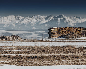 Scenic view of snowcapped mountains against sky