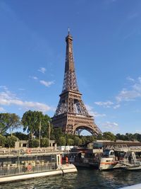 View of tower in city against sky