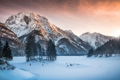 Scenic view of snowcapped mountains against sky during winter