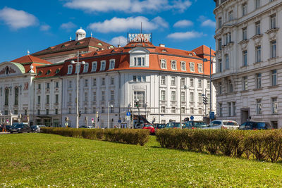 Buildings in city against sky