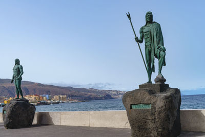 Low angle view of statue against clear sky