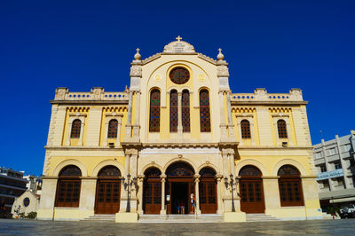 Exterior of church against clear blue sky