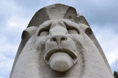 Low angle view of statue against sky