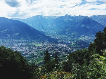 Aerial view of landscape and mountains against sky