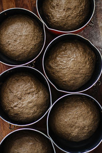 High angle view of bread in bowls on table