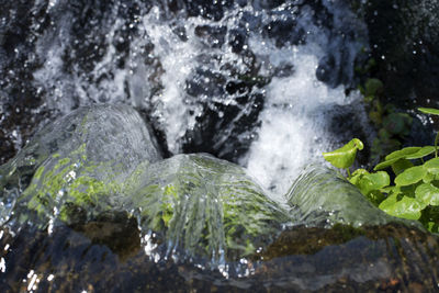 Close-up of waterfall on rocks