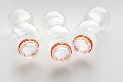 Close-up of glass bottle against white background
