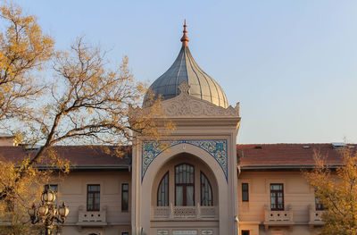 Exterior of mosque against clear sky