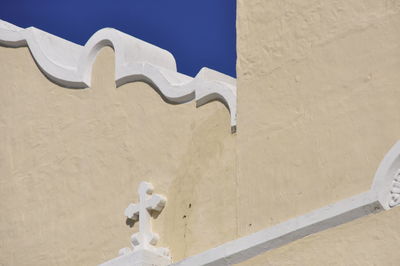 Statue against clear blue sky