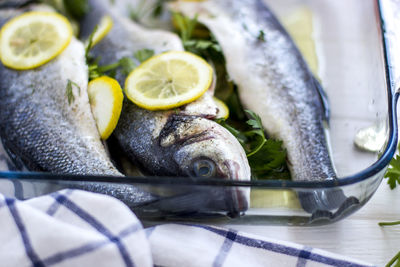 Close-up of fish in plate on table