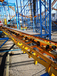 Railroad tracks against clear blue sky