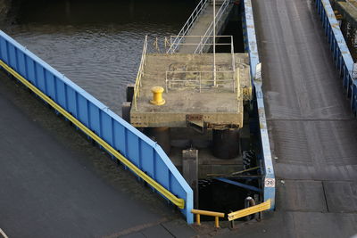 High angle view of yellow bridge over water