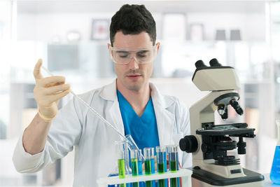 Young scientist working in laboratory