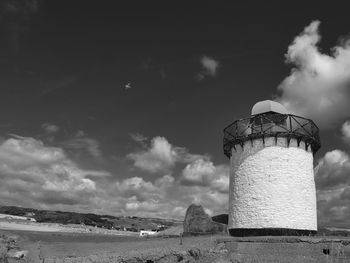 Low angle view of water tower against sky