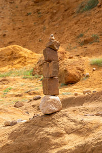 Rear view of statue on rock