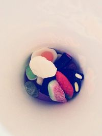 Close-up of colored pencils on white background