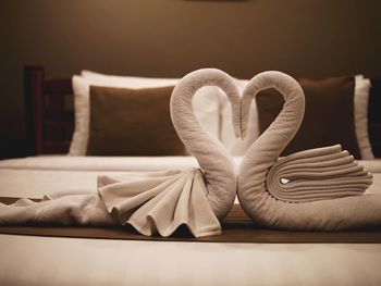 Close-up of heart shape on table at home