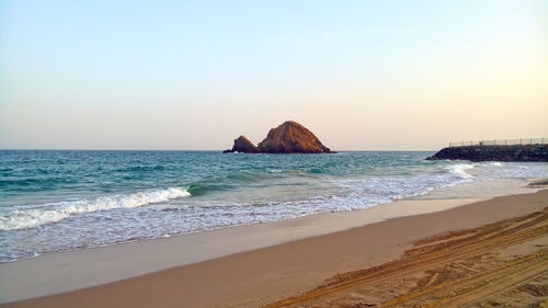 Scenic view of sea against clear sky