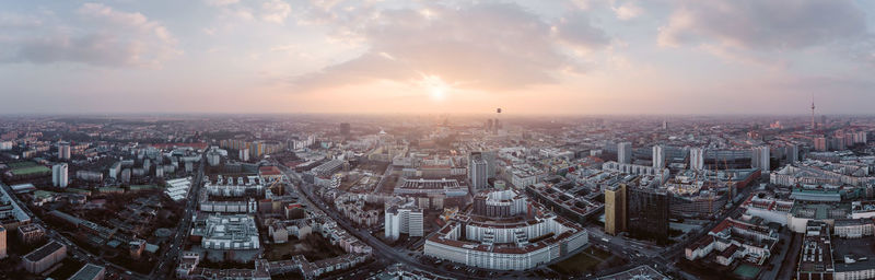 High angle view of city buildings during sunset