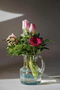 Close-up of flower vase on table