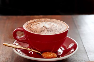 Close-up of coffee cup on table