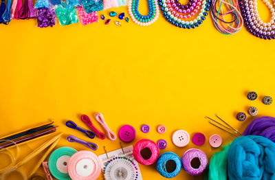 Close-up of multi colored pencils on table