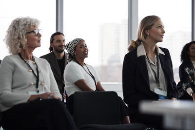 Business people sitting during business meeting