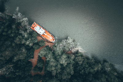 High angle view of abandoned boat by sea