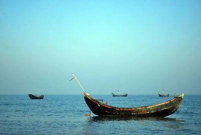 Sailboat sailing in sea