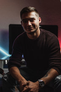 Portrait of young man smiling