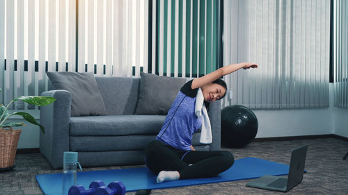 Woman exercising in gym