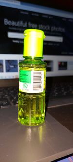 Close-up of glass bottle on table