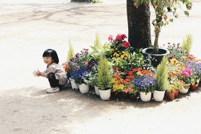 Boy playing with umbrella