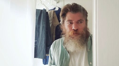Portrait of man looking at camera