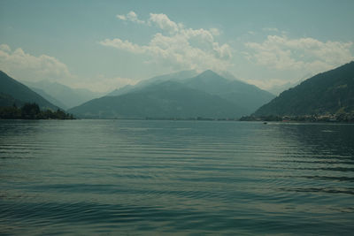 Beautiful view of a calm lake with reflection of trees in the water