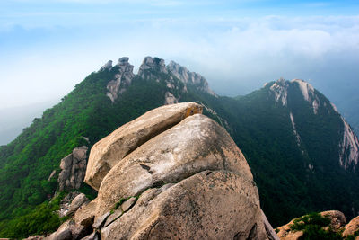 Scenic view of rocky mountains against sky