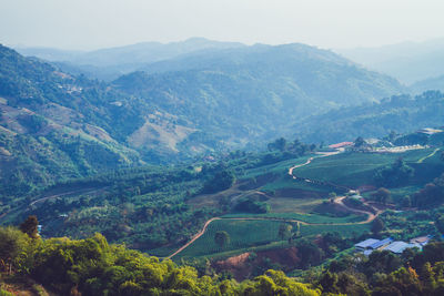 High angle view of landscape and mountains against sky