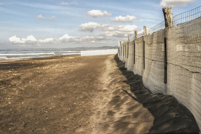 Scenic view of beach against sky