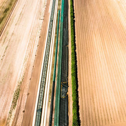 Aerial view of a test field of a farm, on which various foils and planting aids are tested